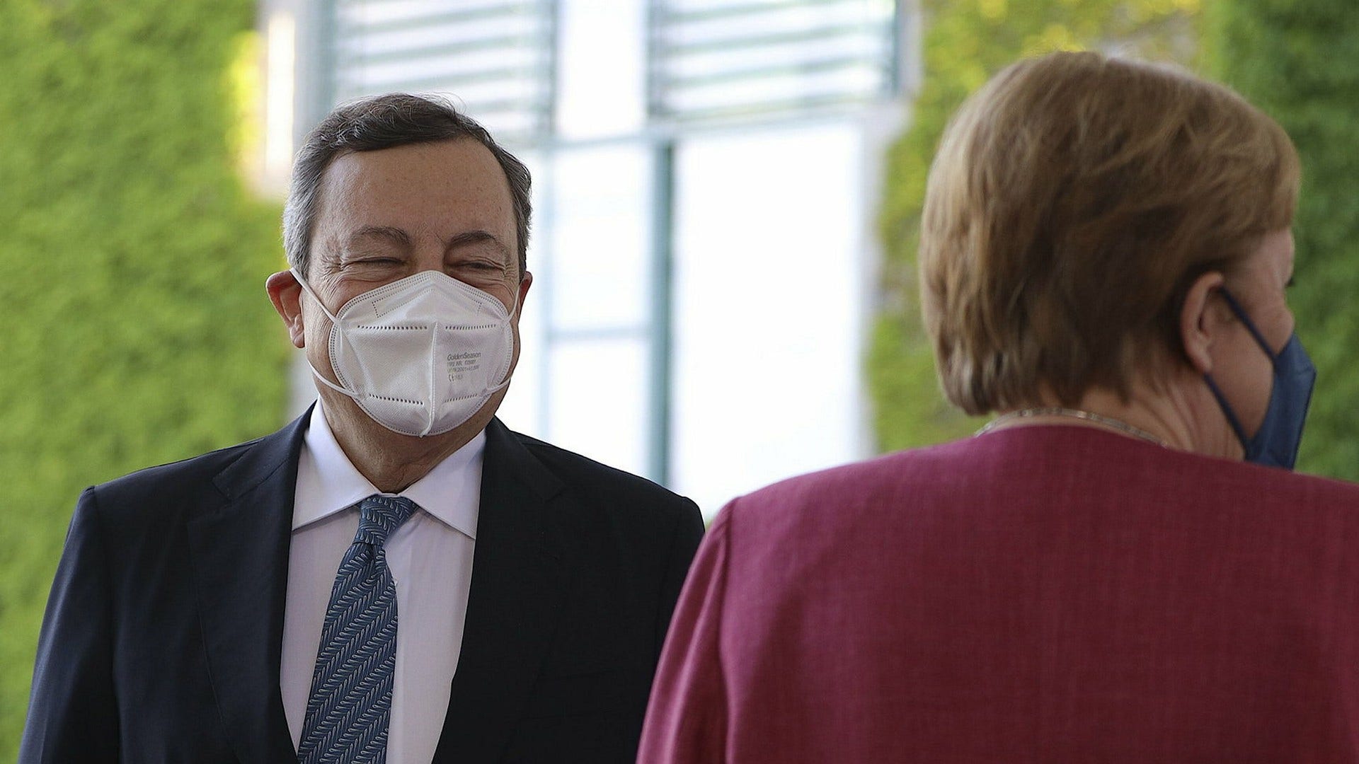 Mario Draghi och Angela Merkel.