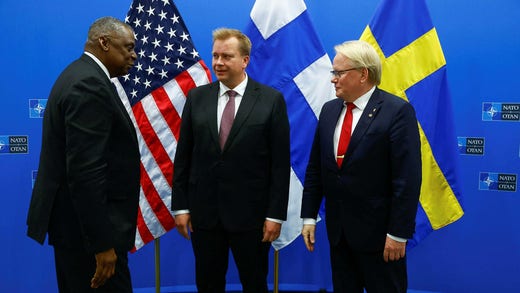 From left: US Defense Secretary Lloyd Austin, Finland's Antti Kakkonen, and Sweden's Peter Holtqvist.