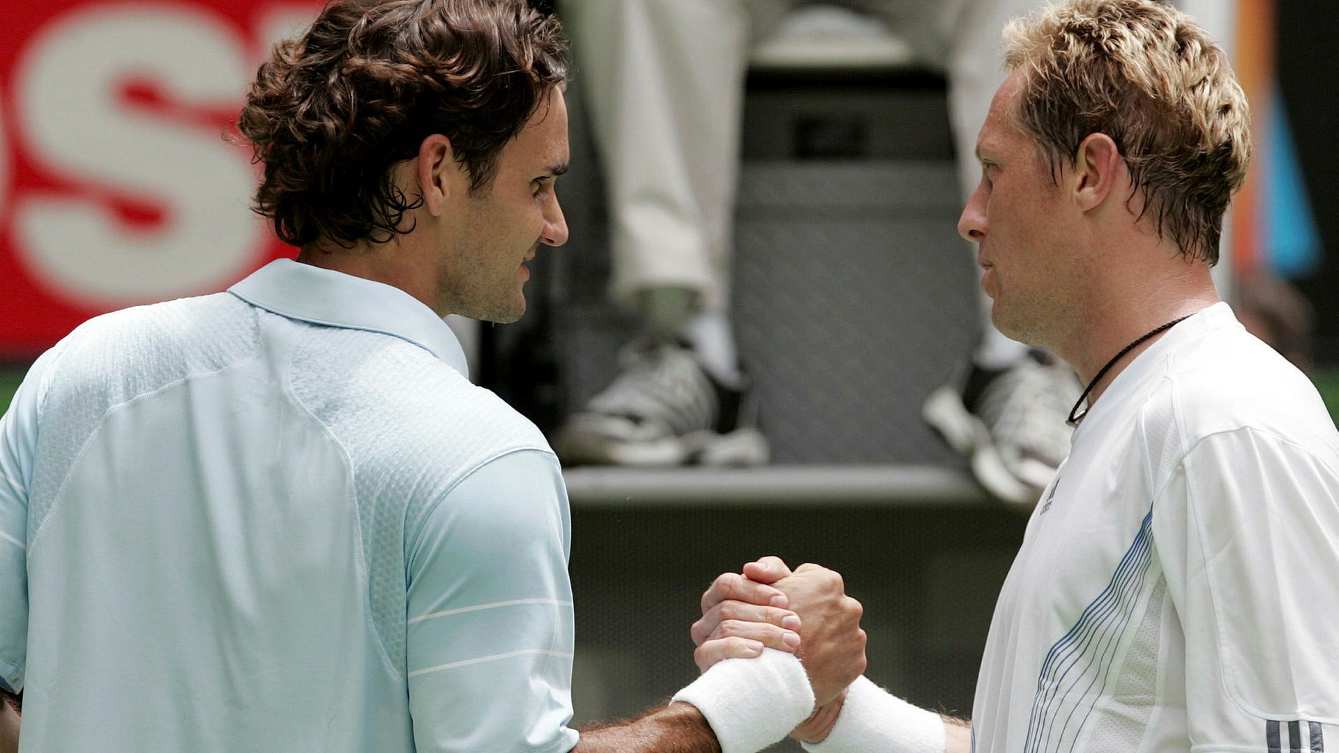 Roger Federer och Jonas Björkman efter mötet i Australian Open 2007.
