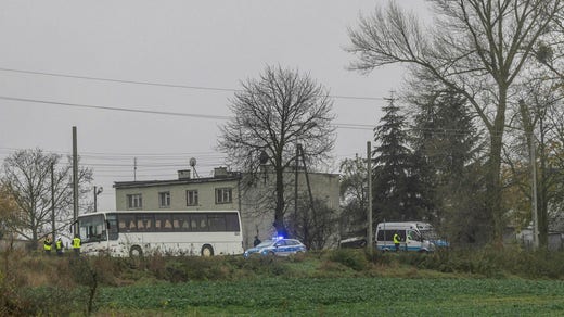 Ukrainian police near the site of the robot strike.