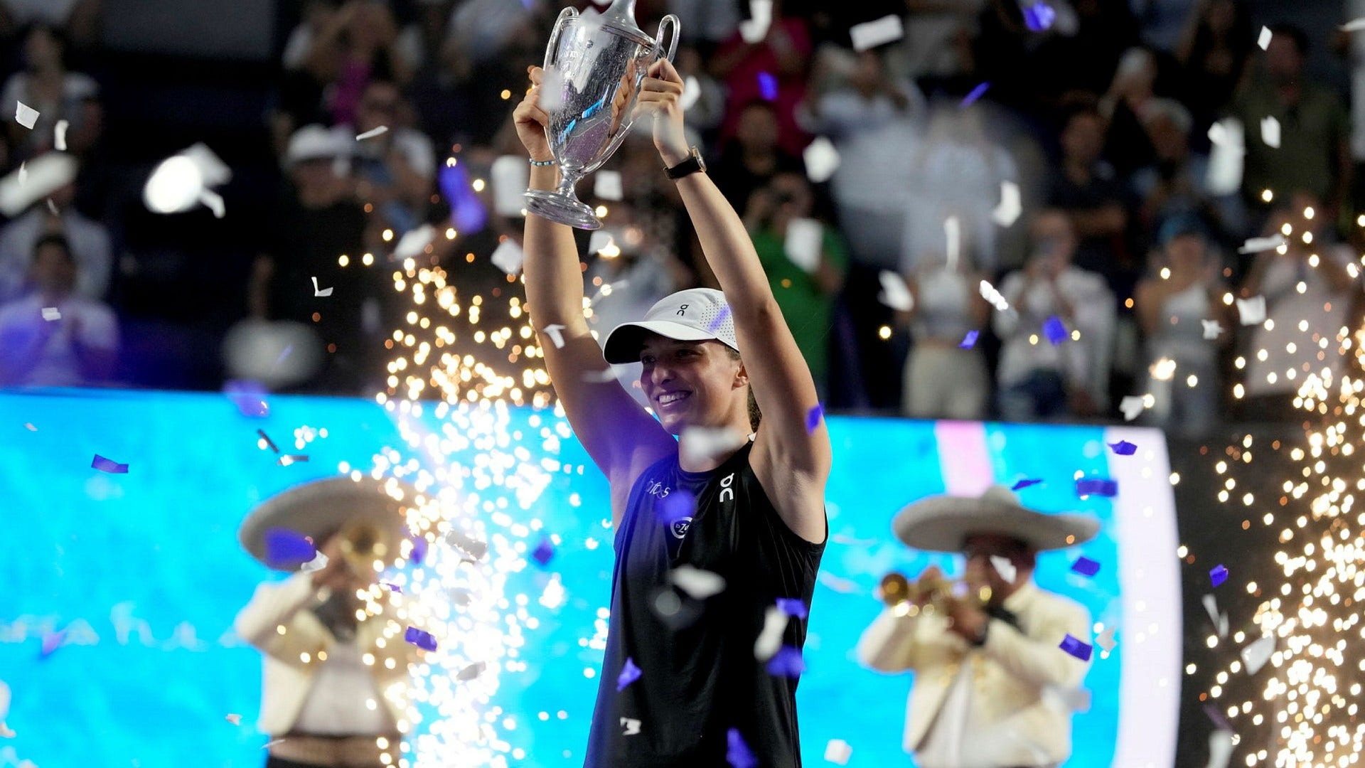 Swiatek Dominates in WTA Finals Win, Secures World Number One Ranking