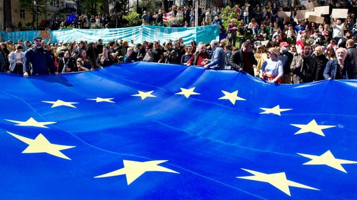 Demonstrators gathered in front of Parliament in Tbilisi on Monday and raised the European Union flag.