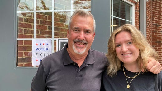 Jim and Julia, father and daughter, vote for Republican Brian Kemp to block Trump candidates.