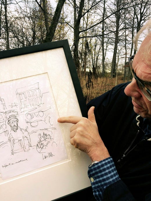 Lars Vilks med teckningen ”Profeten M. som rondellhund”.