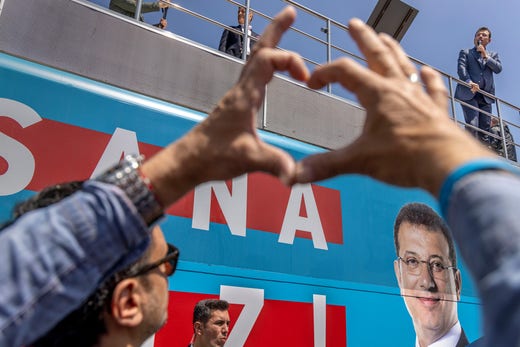 The gesture of heart is made by a supporter of Ekrem Imamoglu - who has become associated in the campaign with opposition presidential candidate Kemal Kilicdaroglu.