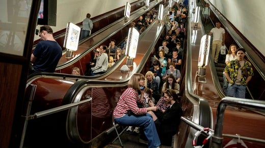 People are looking for shelter in the Kiev subway on Monday.