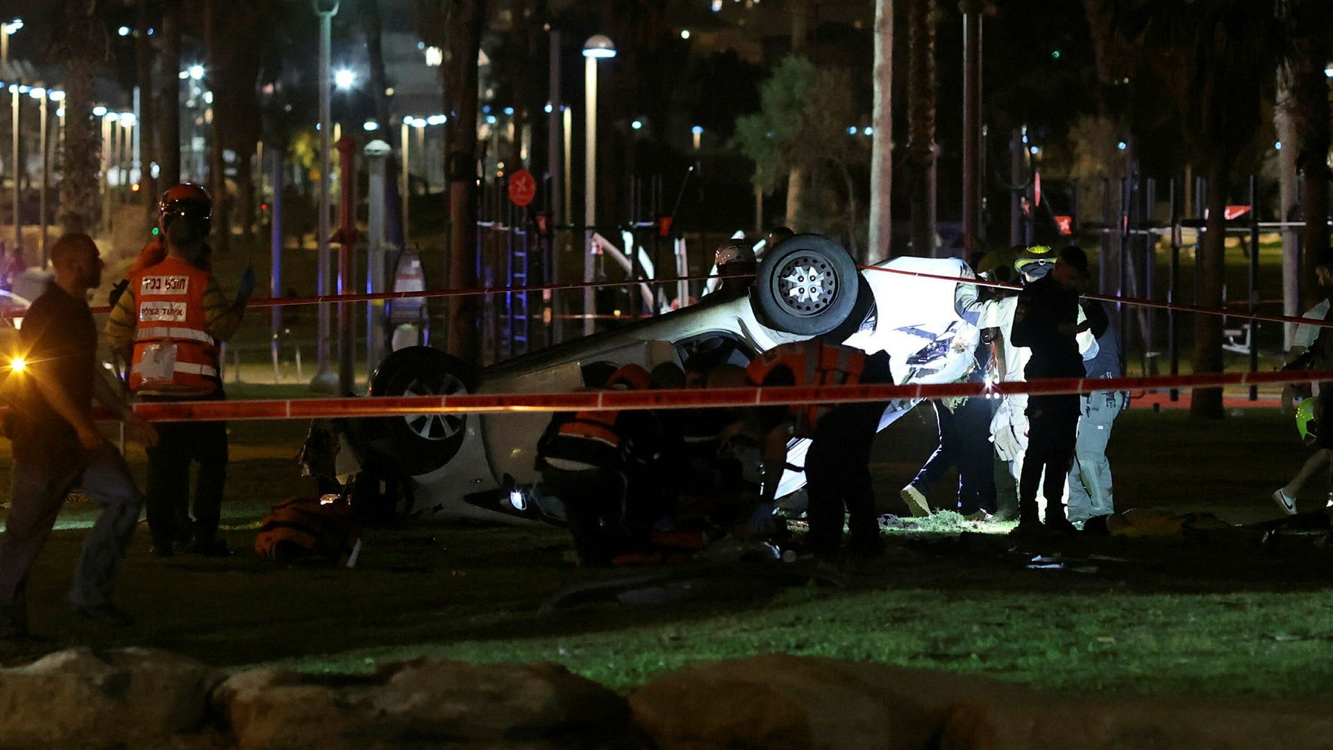 The car allegedly used to commit the crime in Tel Aviv overturned after hitting several people.