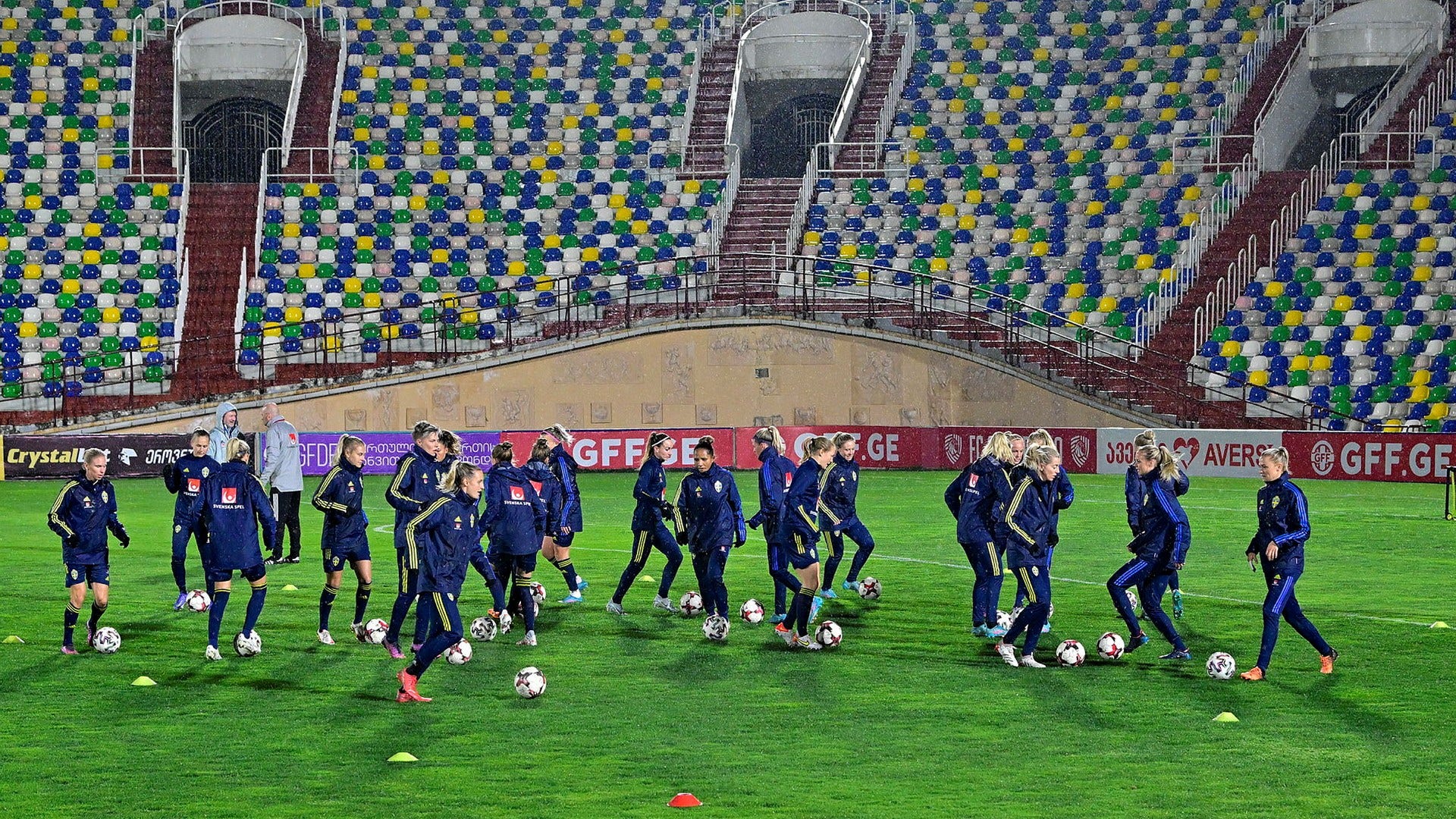 The soccer ladies wear Ukraine pins in the World Cup qualifier against Georgia