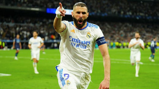 Karim Benzema gjorde ett av målen när Real Madrid vände och skickade ut Manchester City efter 3–1-seger på hemmaplan i lagens andra semifinalmöte.