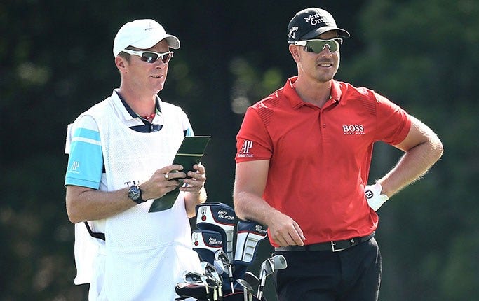 Henrik Stenson med sin caddie Gareth Lord.