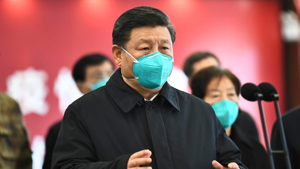 Xi Jinping under besöket i Wuhan på tisdagen 10 mars.